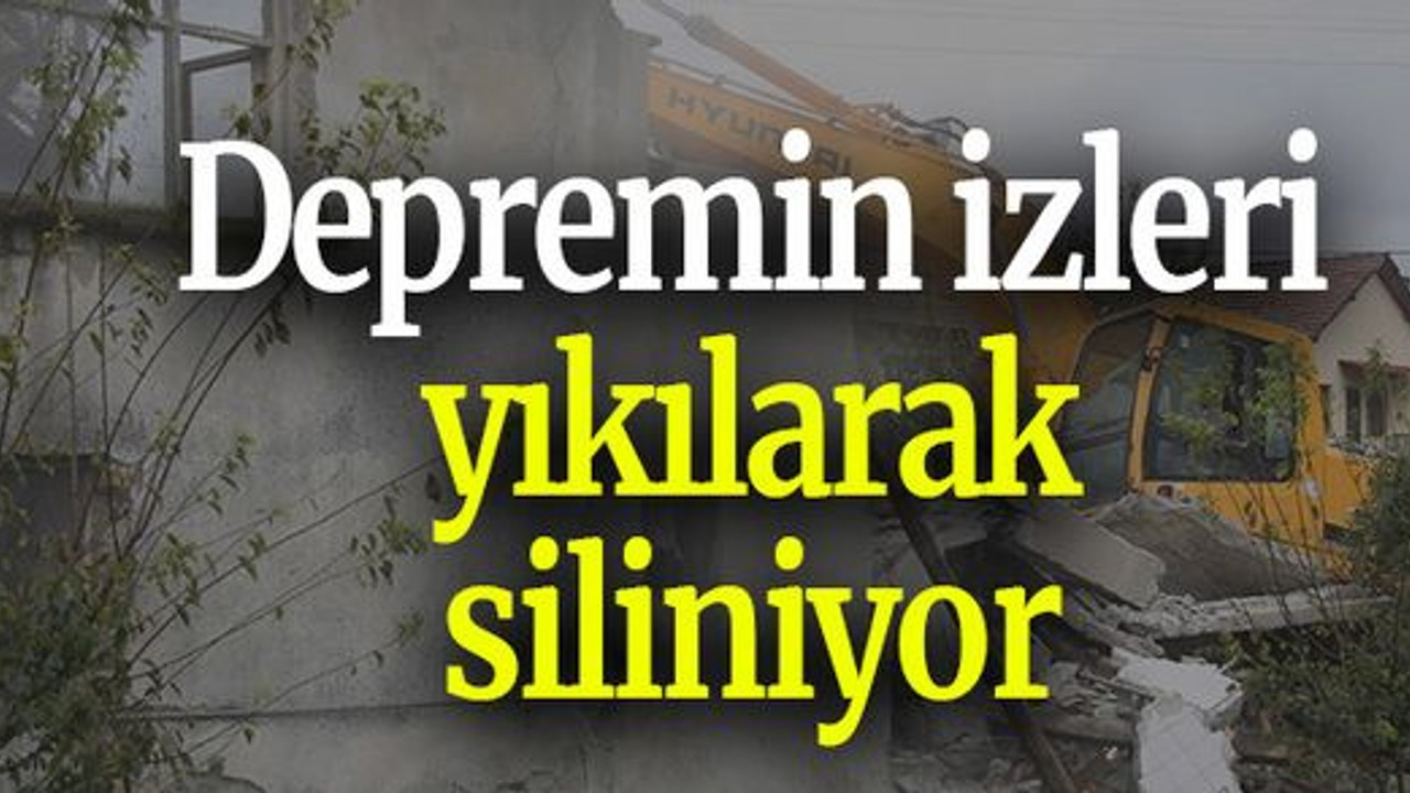 Depremin izleri yıkılarak siliniyor